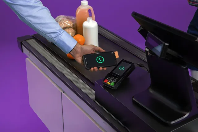 payment with smartphone at CCV A35 in supermarket